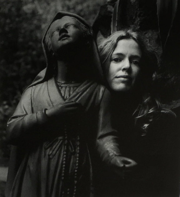 imogen cunningham untitled girl posing with statue st bernadette 1973